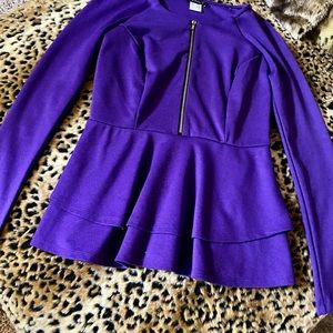 Purple shirt with a little zip up